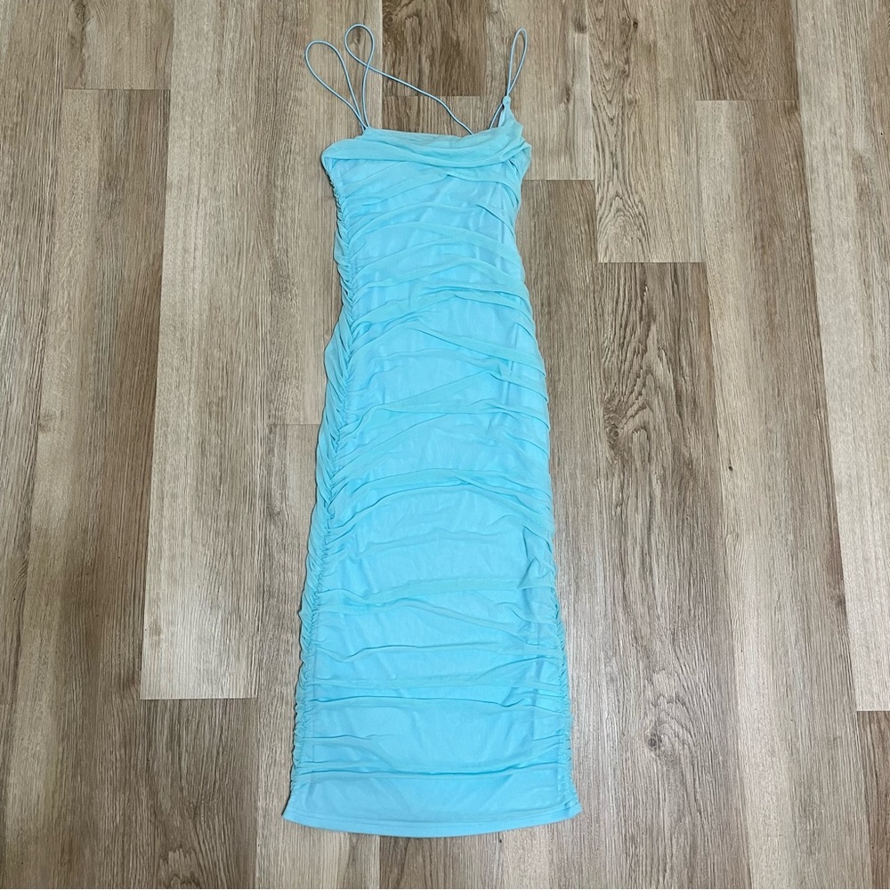 EDGES OF HER DRESS